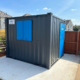 Another happy customer taking delivery of a Garden Office Unit